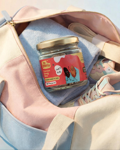 Pro Bites Co Munakka Badam Oats jar tucked into a canvas tote bag