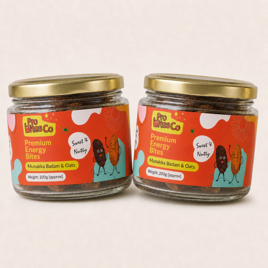 Two jars of Pro Bites Co Munakka Badam Oats energy bites with orange labels