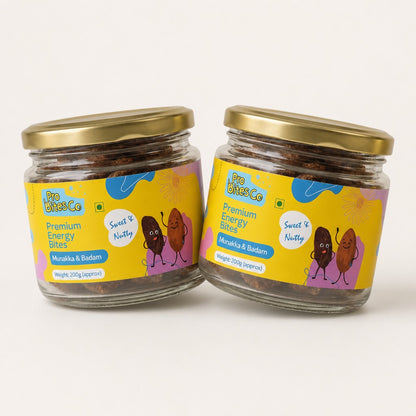 Two jars of Pro Bites Co Munakka Badam energy bites with yellow labels